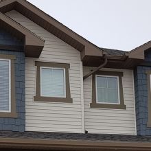 New Construction - Vinyl Siding - Hardie Shakes with Laced Corners - KWP Trims - Soffit - Fascia - Eavestrough - Regina, SK.