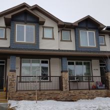 New Construction - Vinyl Siding - Hardie Shakes with Laced Corners - KWP Trims - Soffit - Fascia - Eavestrough - Regina, SK.